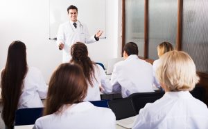 teacher presenting a subject to his class