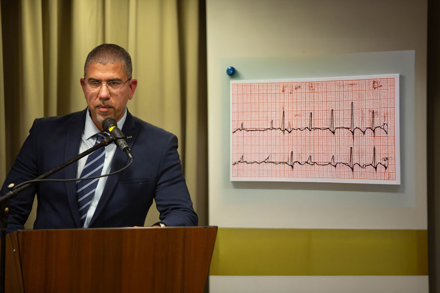 Dr Moshe Cohen speaking at conference for medical studies